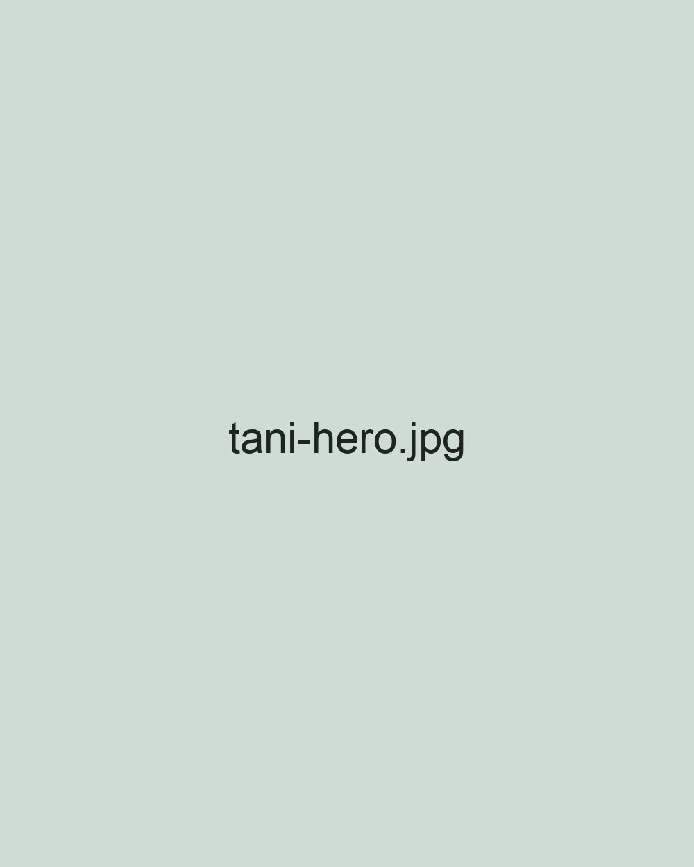 Tani Leeper, health coach, smiling